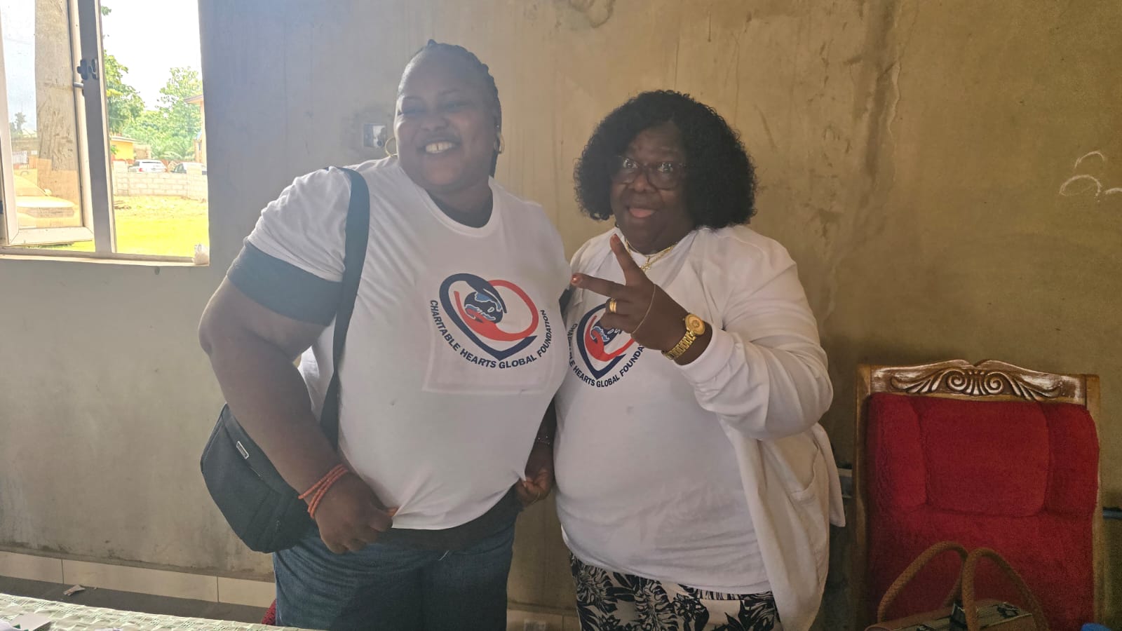Two team members celebrating another successful outreach day