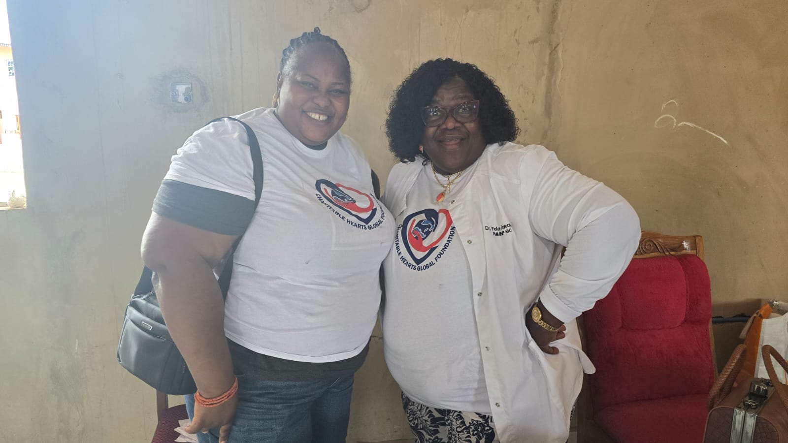 Dr. Fola Awolaja with a team member ahead of outreach