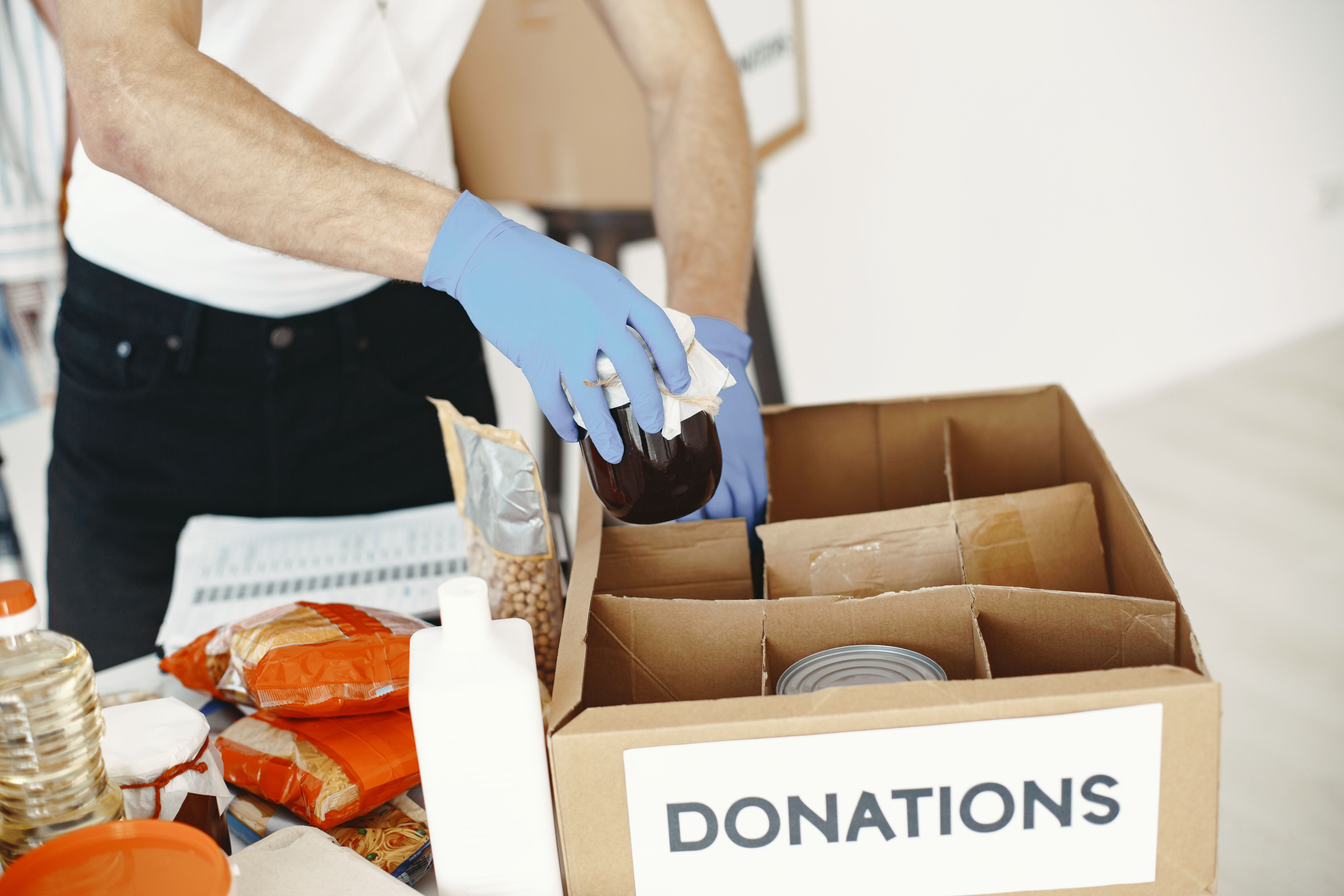 Volunteers organizing community resource supplies